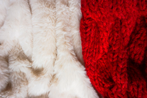 Furry fabric and woolen fabric are placed next to each other.